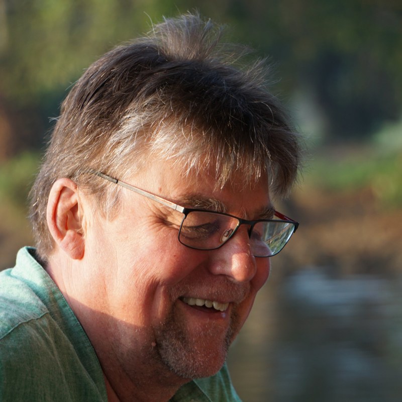 Porträt von Joachim Albert Hennche, herzlich lachend